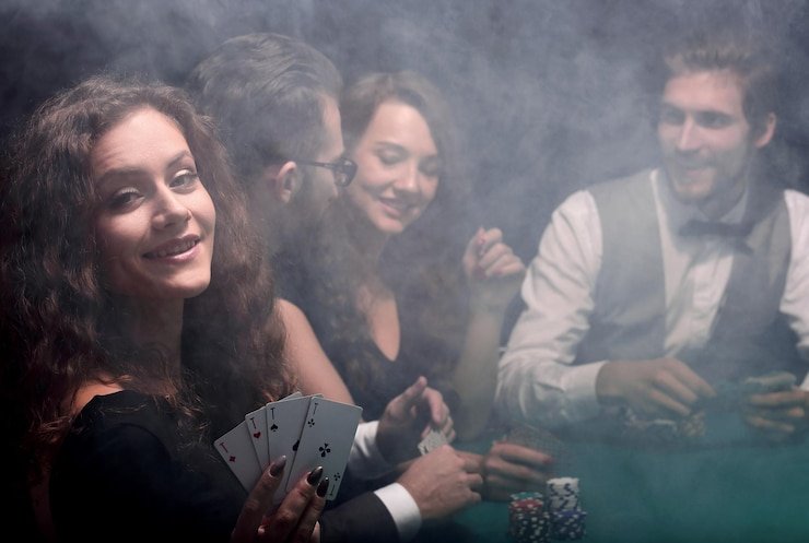 Close-up of live dealer at baccarat table during tournament session